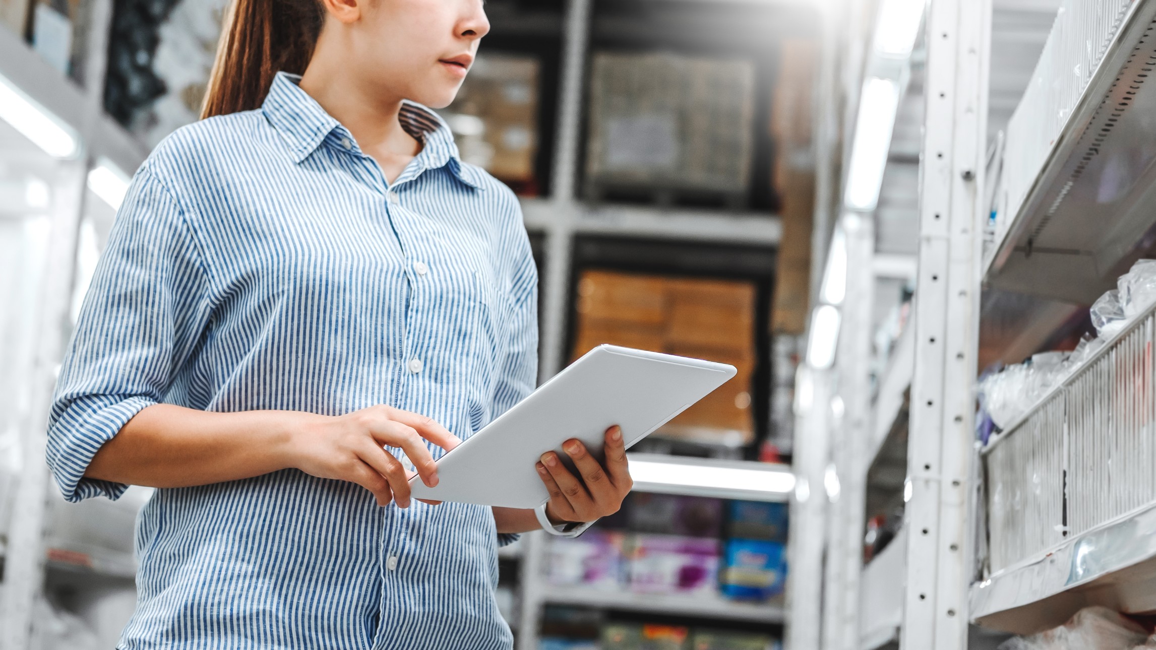 asian-woman-worker-working-with-digital-tablet-checking-boxes-logistic-import-and-export-supplies_t20_Ozv1jE