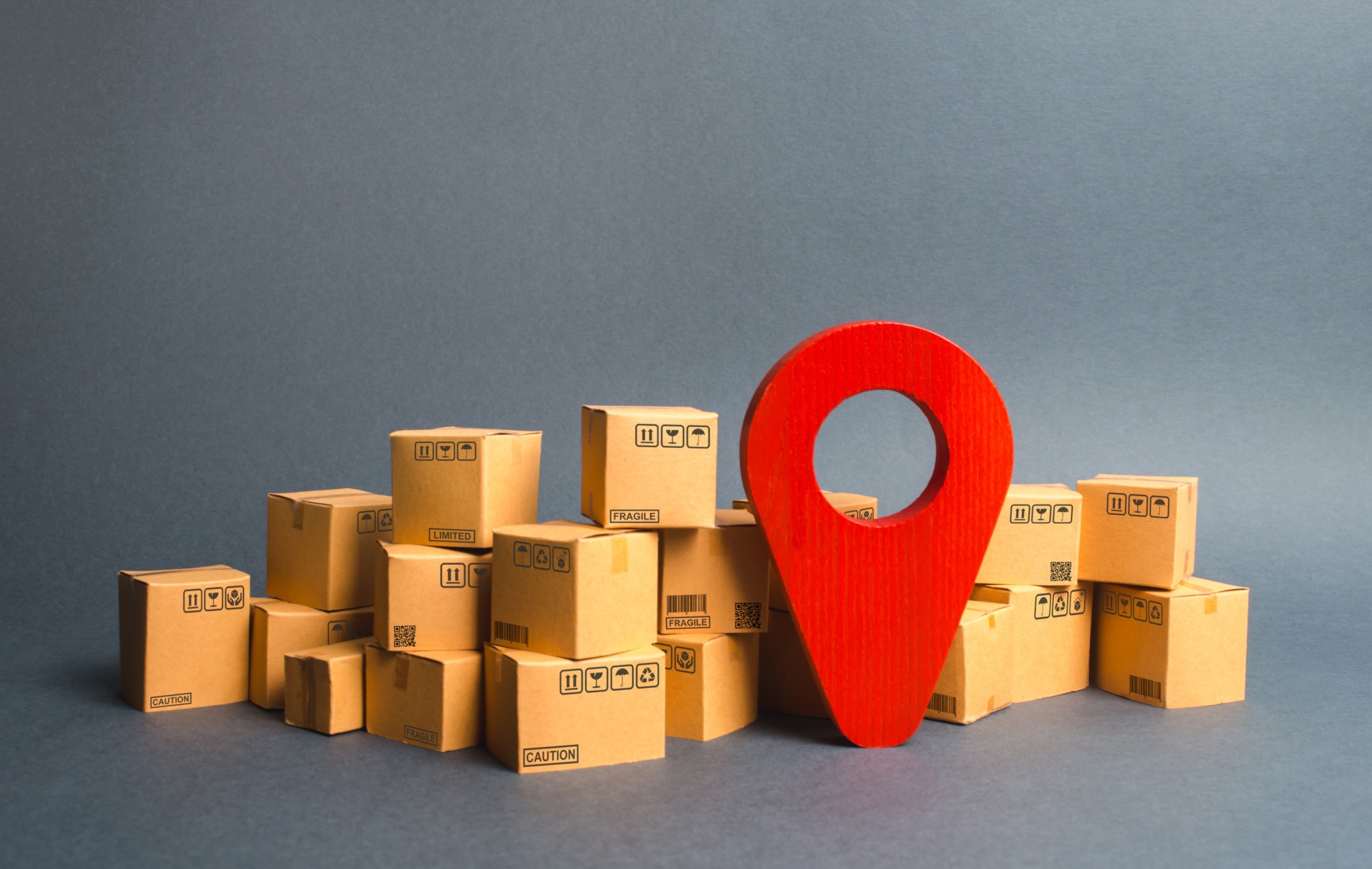 lots-of-cardboard-boxes-and-a-red-position-pin-locating-packages-and-goods-algorithm-for-constructing_t20_XxNar6